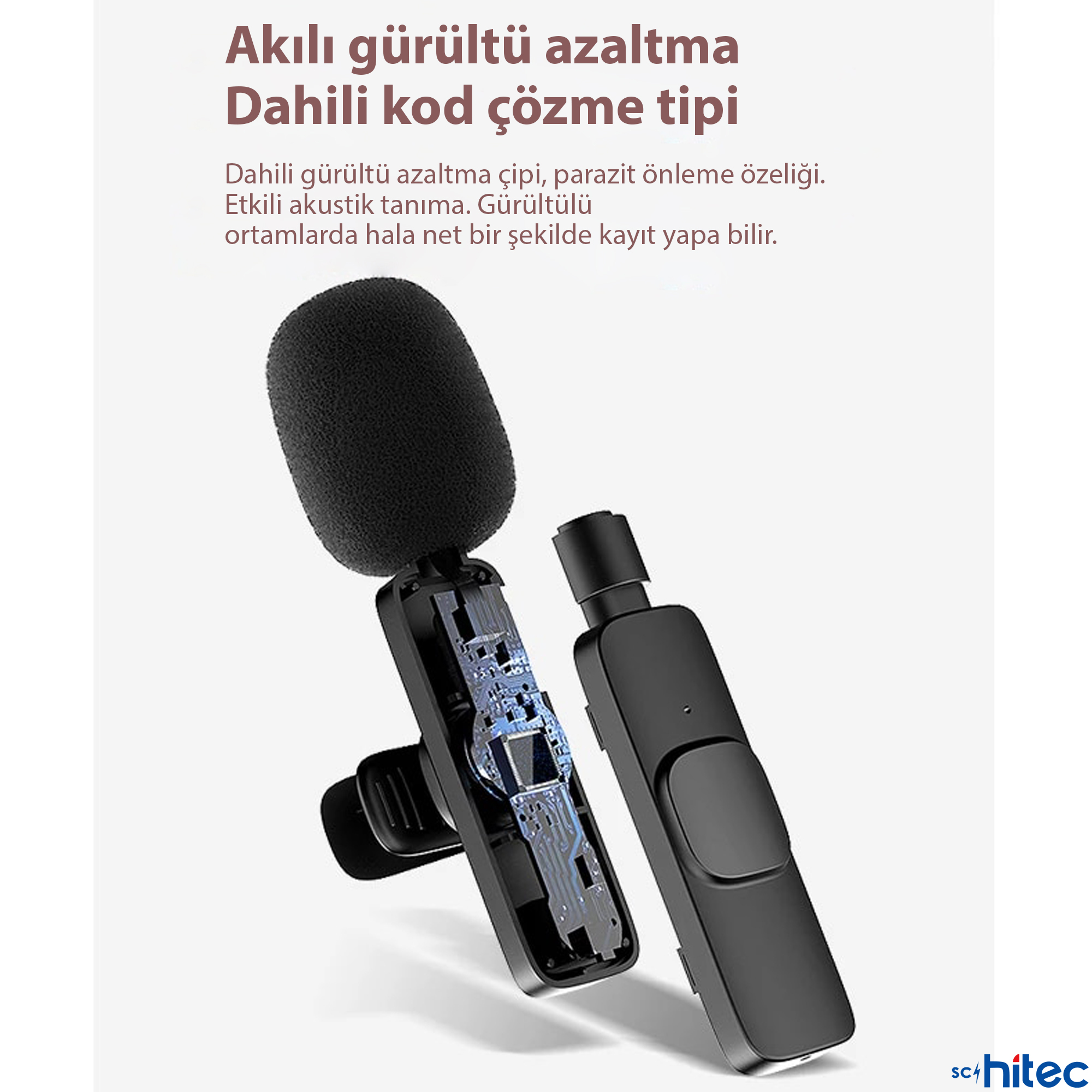 Açık kasalı siyah mikrofon, devre kartını gösteriyor. Yanında verici var.