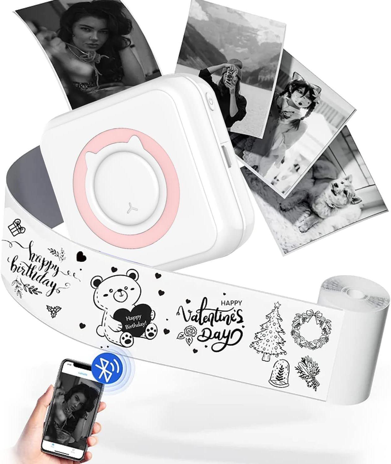 Ein weißer tragbarer Drucker druckt Fotos und eine dekorative Papierrolle mit Bären und Feiertagen.
