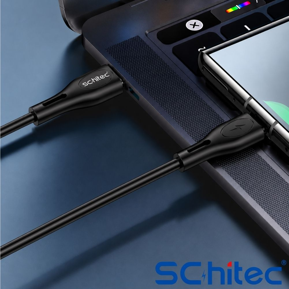 Siyah bir USB kablosu bir akıllı telefonu bir dizüstü bilgisayara bağlıyor.