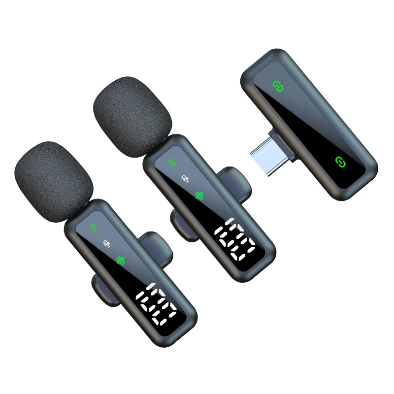Drei schwarze drahtlose Mikrofone mit Schaumstoffüberzügen und digitalen Displays.