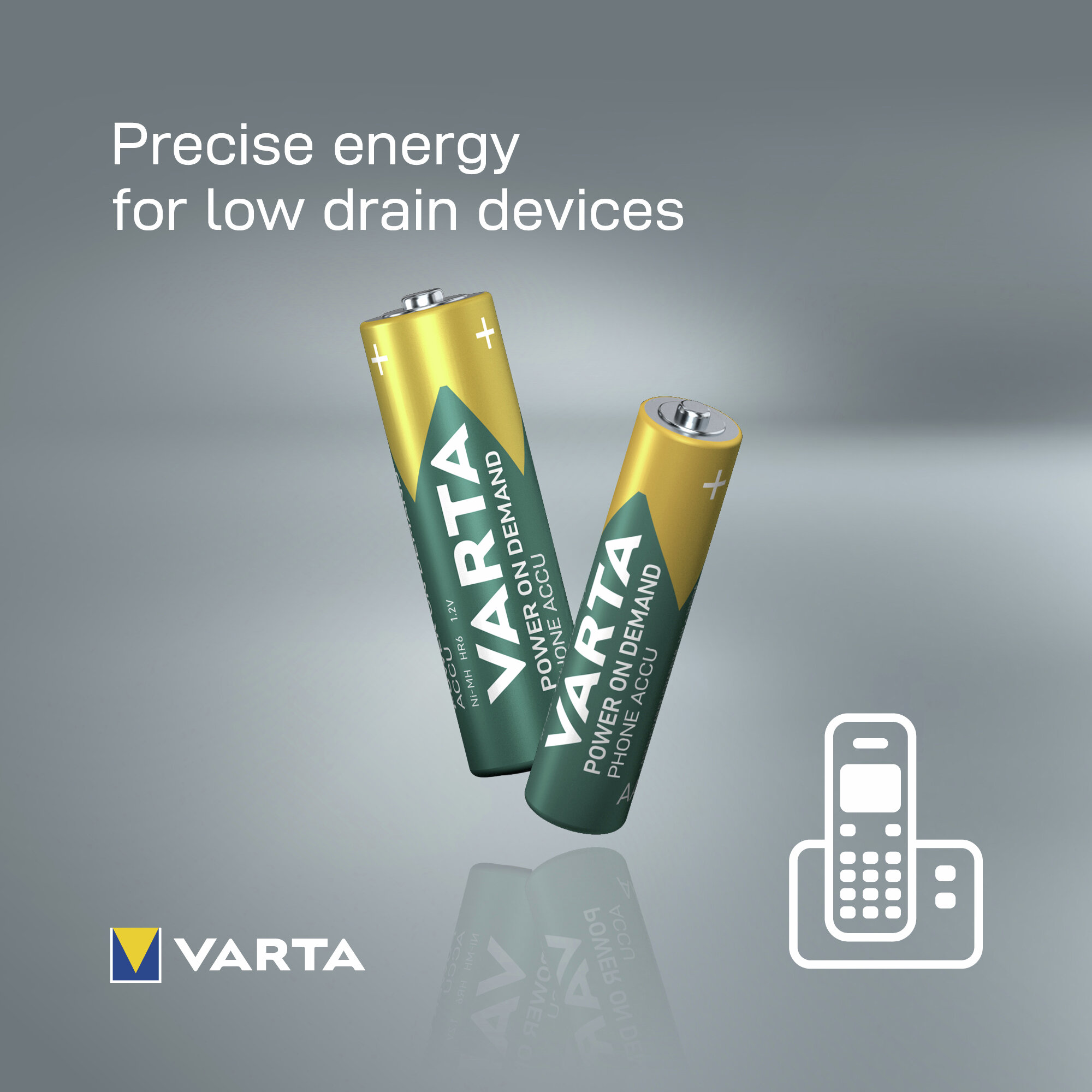Zwei Varta Batterien mit grünem und goldenem Design, daneben ein Symbol für ein schnurloses Telefon.