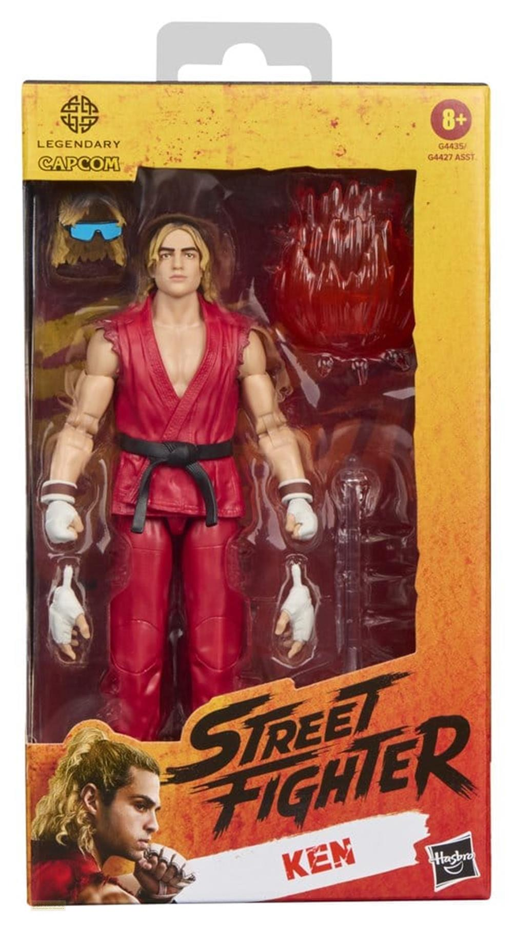 Street Fighter Ken Actionfigur in rotem Outfit mit Zubehör in Verpackung.