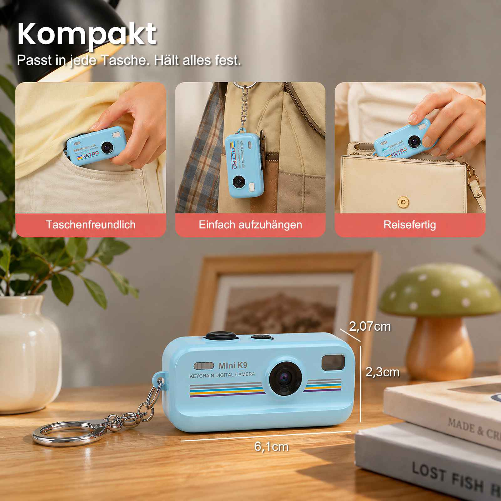 Kompakte blaue Digitalkamera am Schlüsselbund, passt in Tasche, Rucksack und Handtasche.