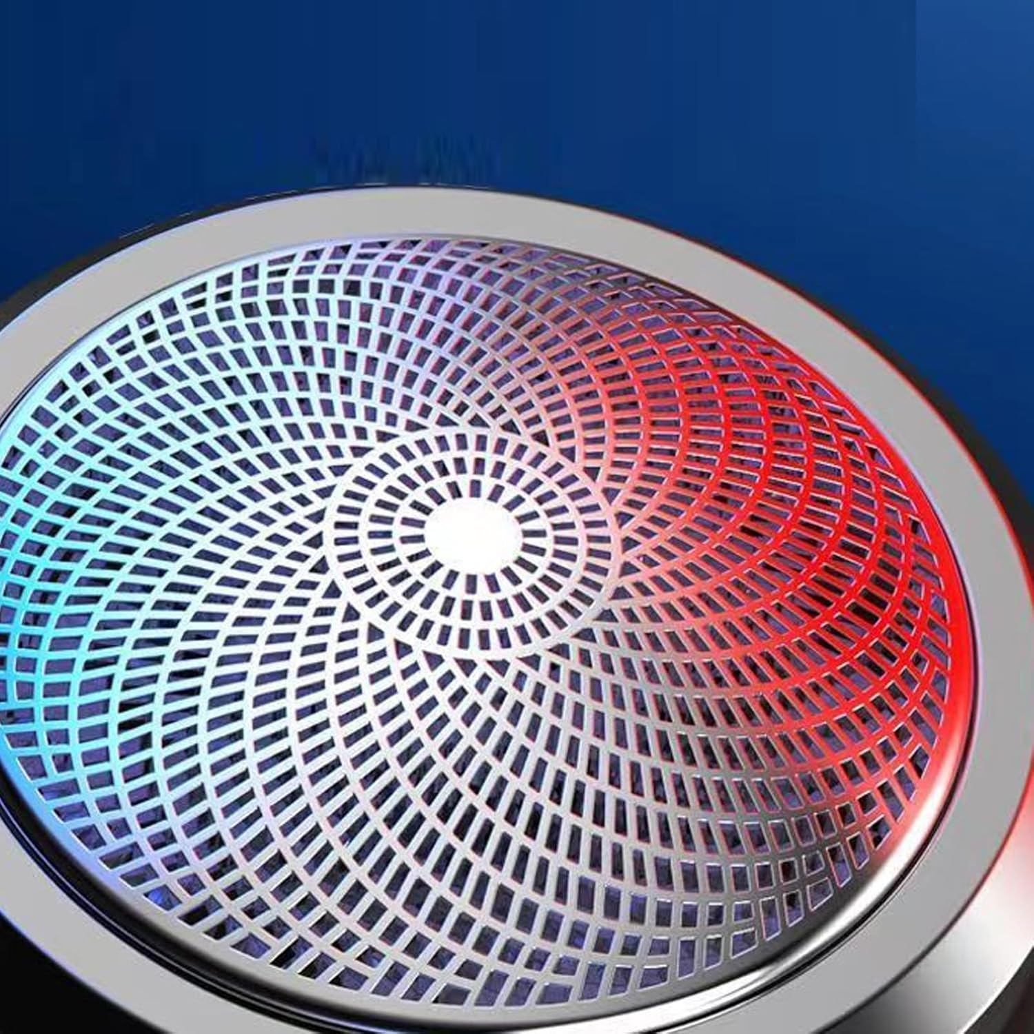 Ein kreisförmiges Metallgitter mit roten und blauen Lichtern auf blauem Hintergrund.