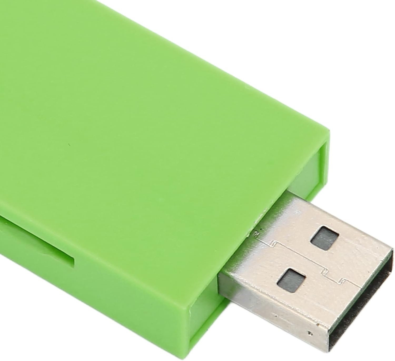 Ein hellgrüner USB-Stick mit freiliegendem Metallstecker.
