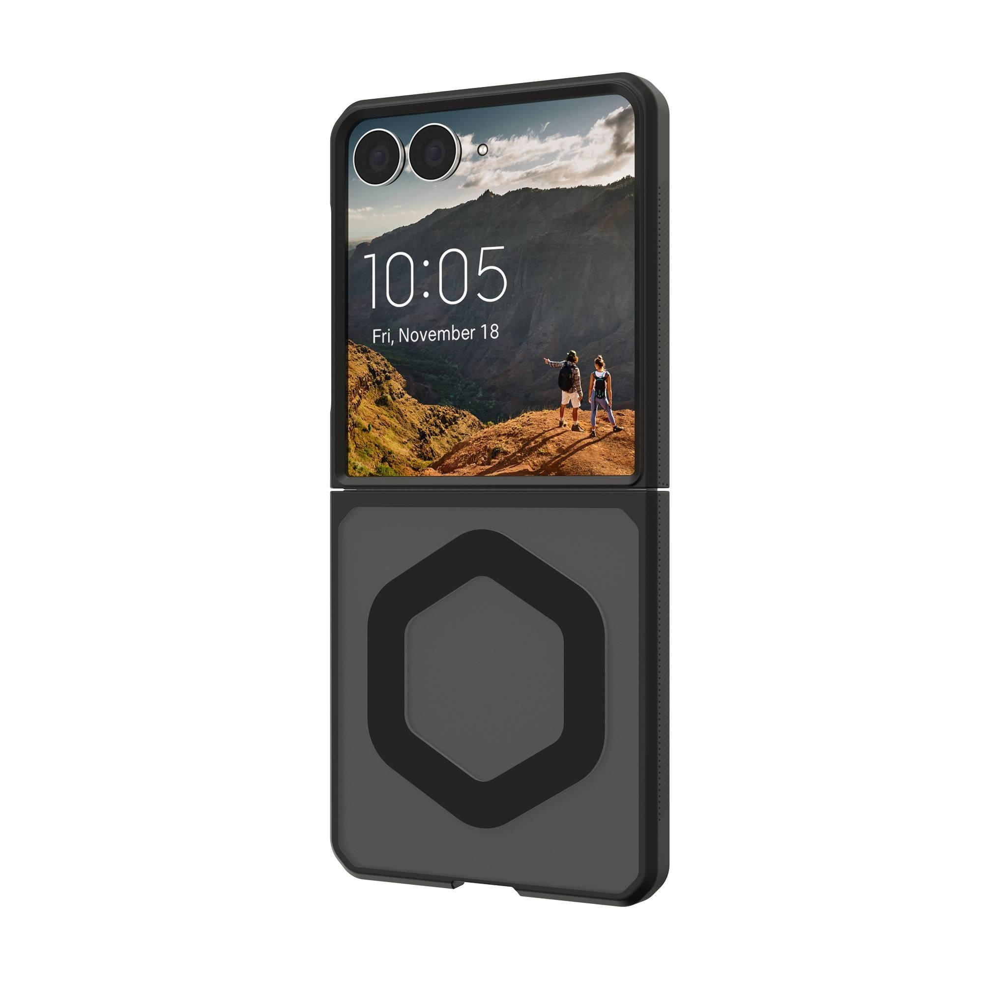 Ein Smartphone mit Berglandschaft-Hintergrundbild und einem sechseckigen Muster.