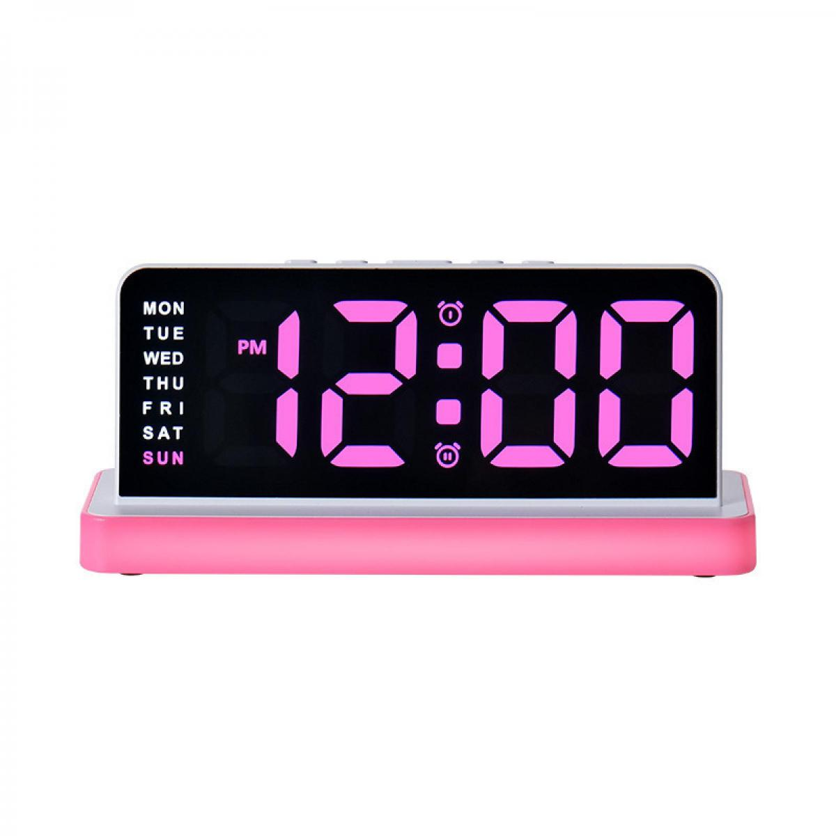 Ein pinkfarbener digitaler Wecker zeigt "12:00 PM" in hellrosa LED an, mit den Wochentagen auf der linken Seite.