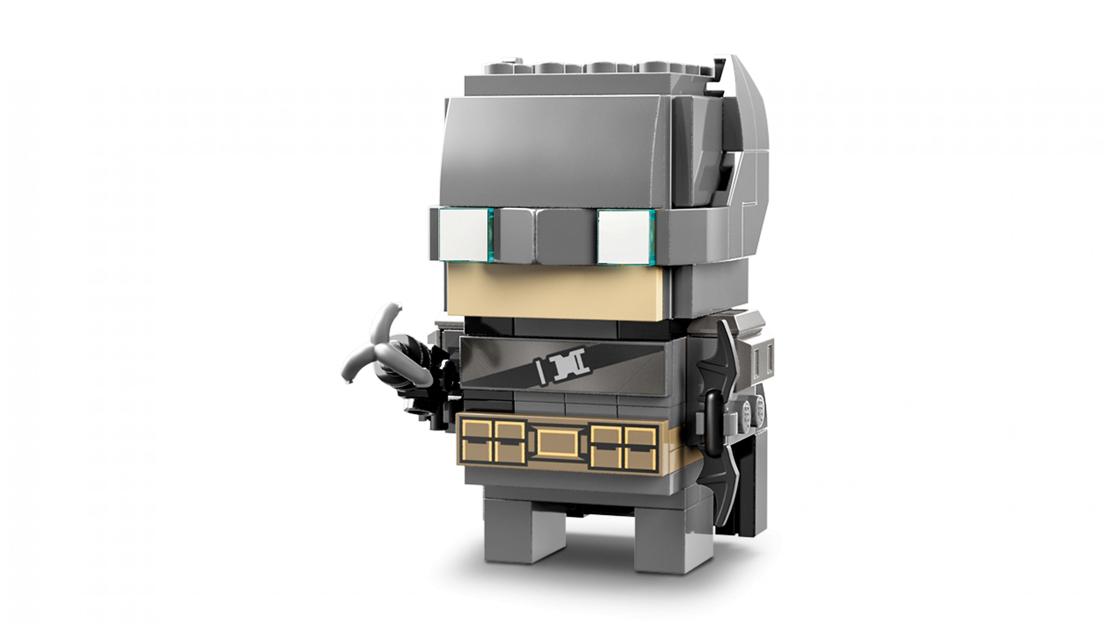 Ein grauer Lego-Charakter mit beigem Gesicht und einem Batarang auf der linken Seite.
