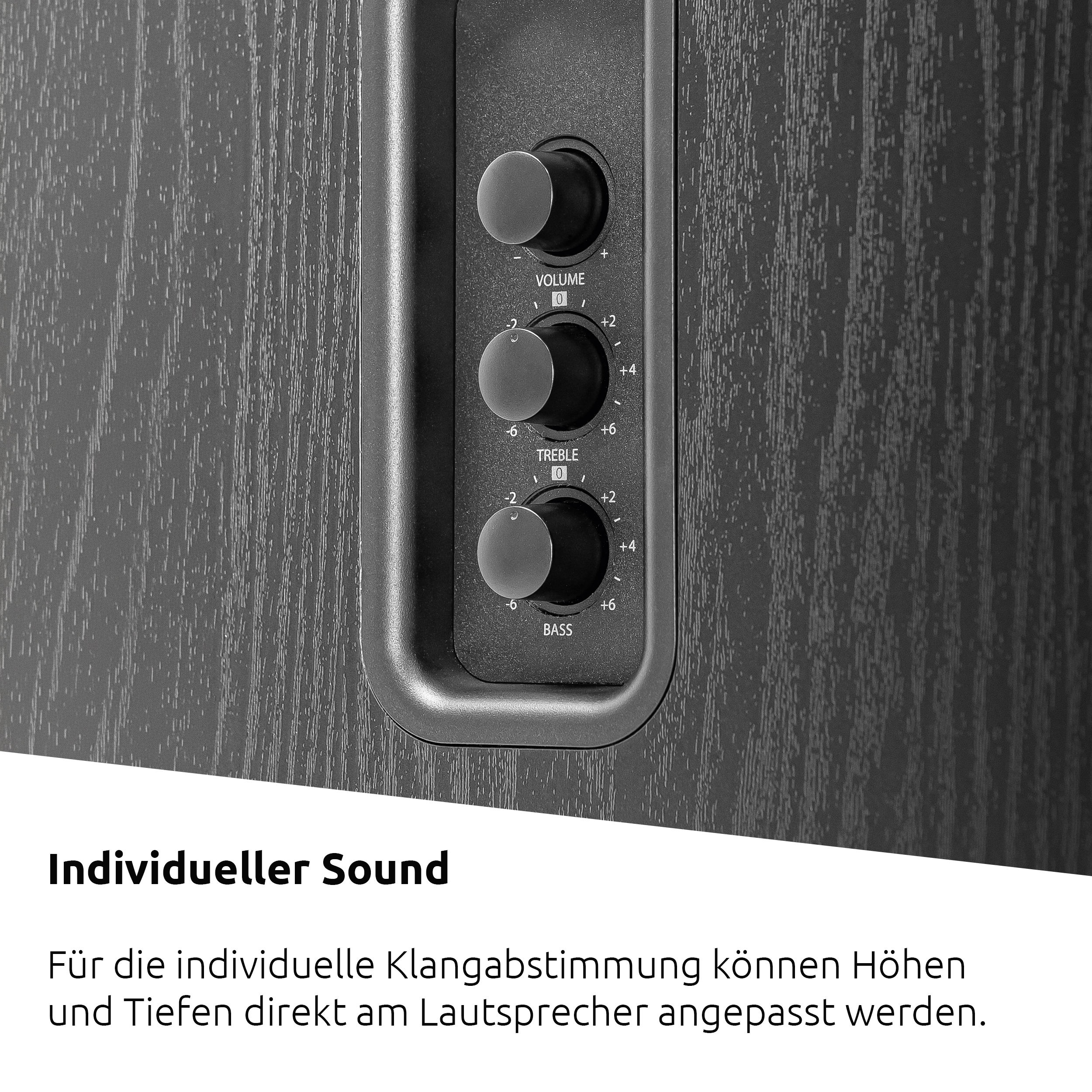 Nahaufnahme von Lautsprecherelementen mit Lautstärke-, Höhen- und Bassreglern.