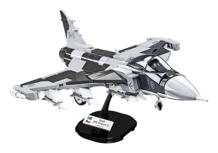 Ein graues und schwarzes Tarnkappenflugzeug-Modell auf einem schwarzen Ständer.