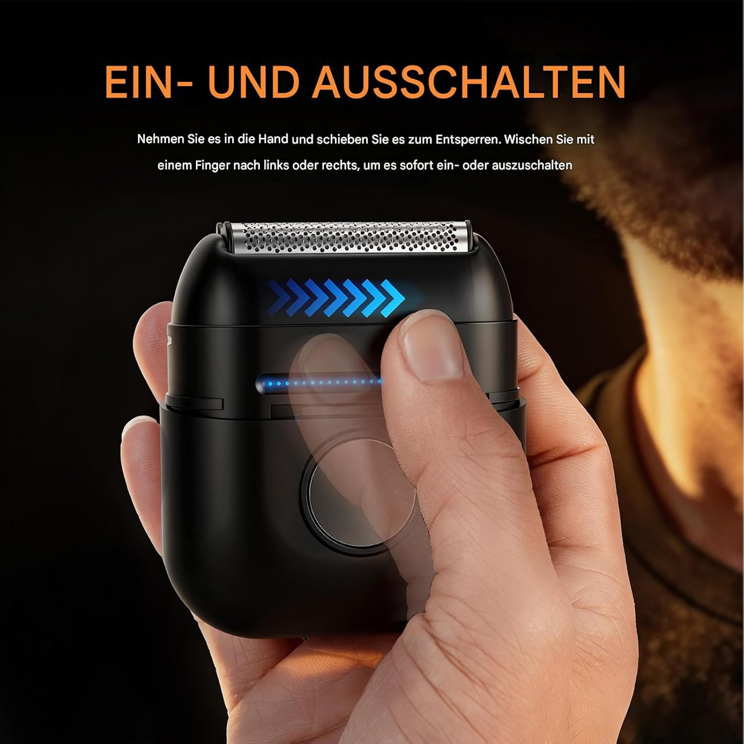 Hand hält schwarzen Elektrorasierer. Blaues Licht zeigt Aktivierung. Von oben.