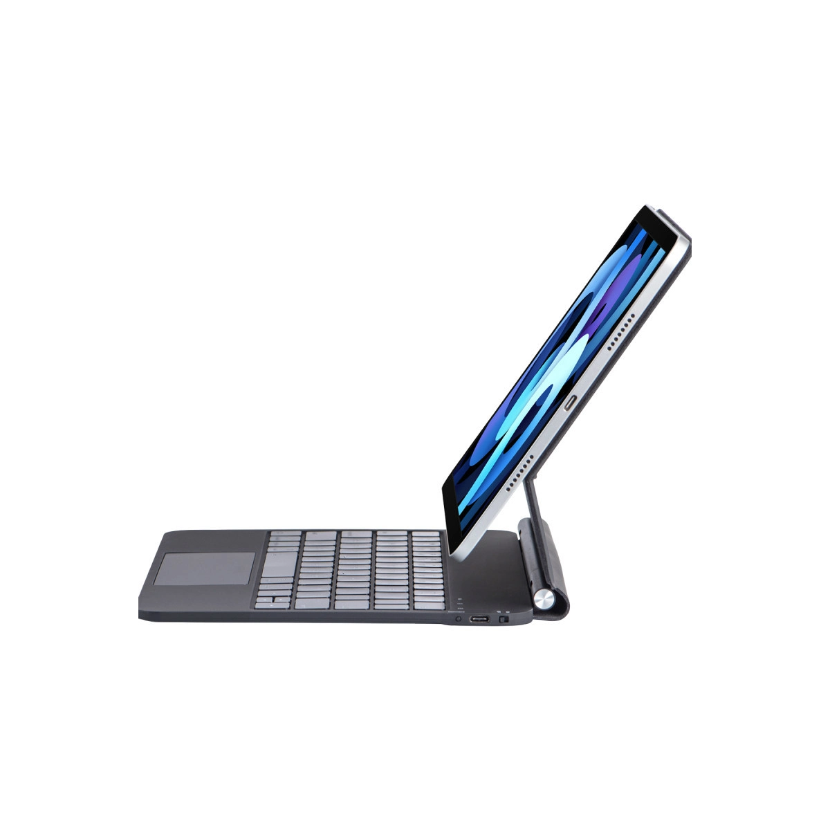 Gümüş renkli bir tablet, dokunmatik yüzeyli siyah bir klavyeye bağlıdır.