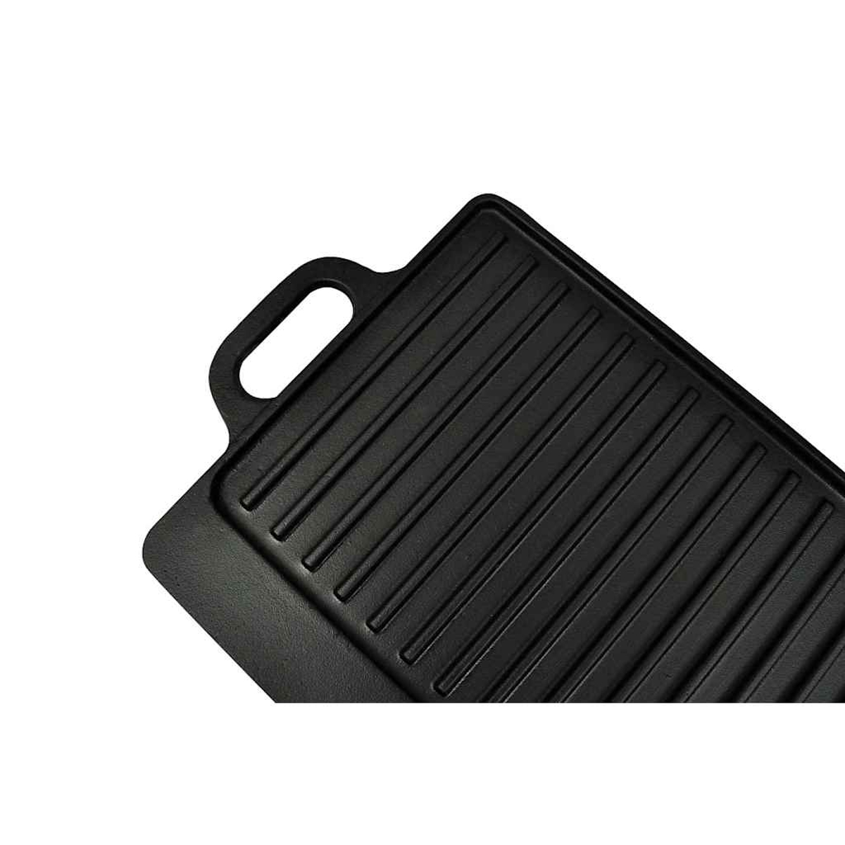 Plancha de hierro fundido negra con crestas elevadas y un asa.