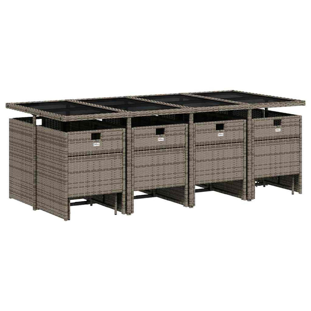 Ein rechteckiger Tisch aus braunem Rattan mit Glasplatte und integrierten Hockern.