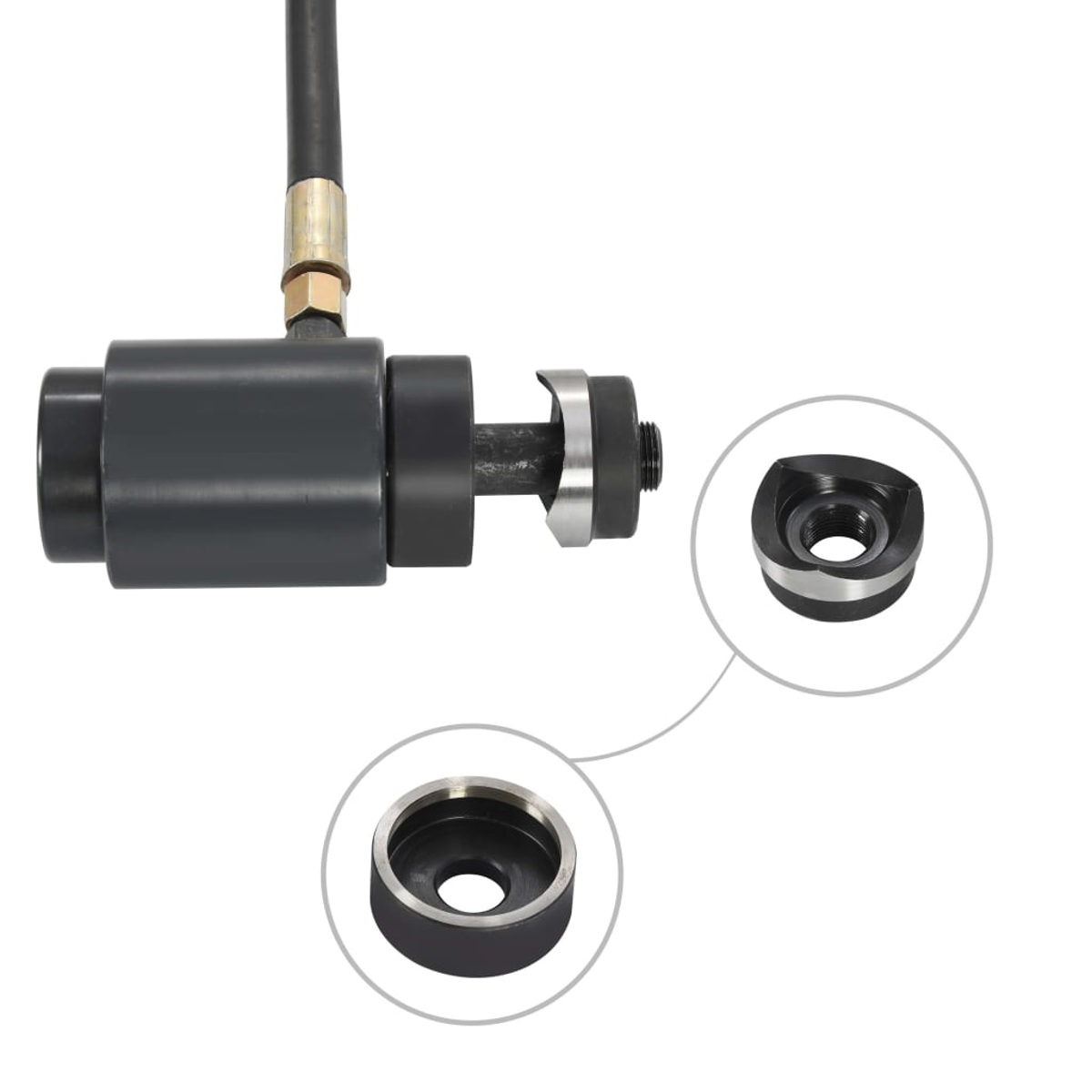 Grauer Hydraulikstanzer mit Schlauch und zwei austauschbaren Schneidwerkzeugen.