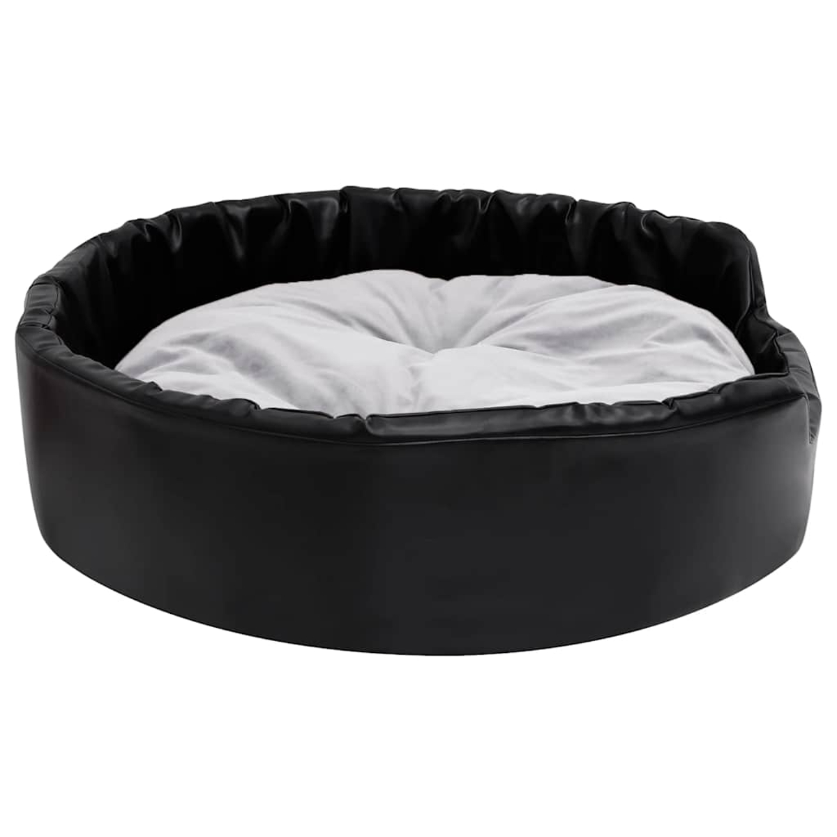 Ein rundes, schwarzes Hundebett mit einem weißen Kissen im Inneren.