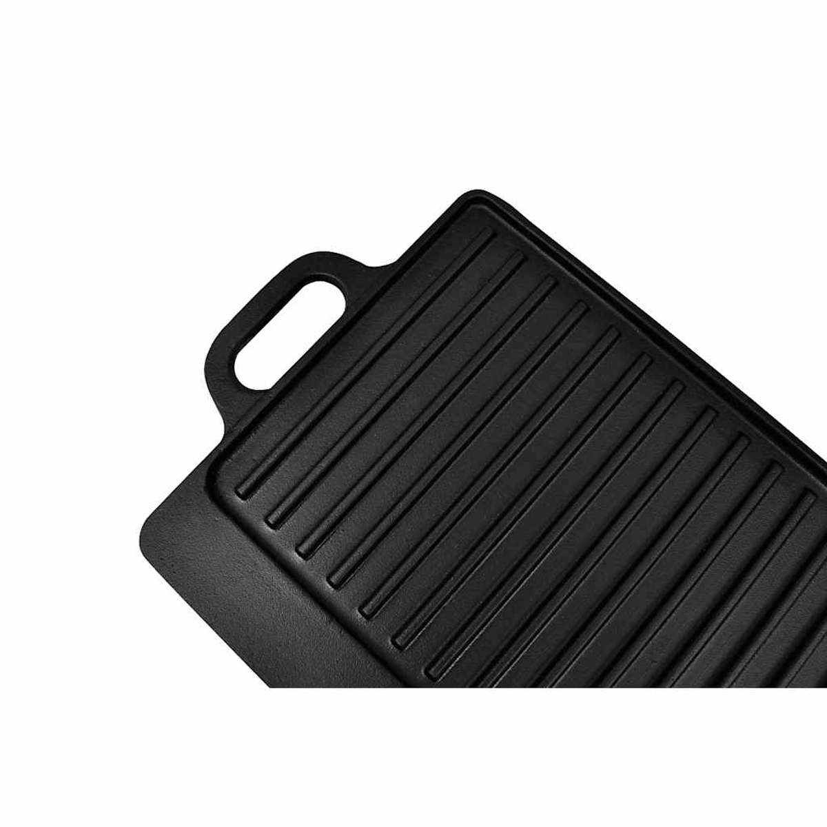 Una piastra grill in ghisa nera con scanalature e manico.