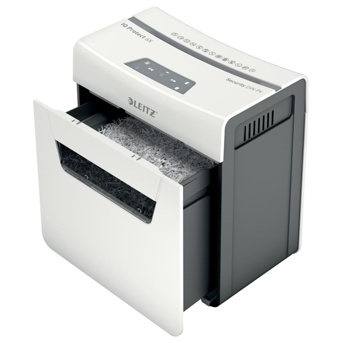 Una trituradora de papel blanca con el cajón extraído, lleno de papel triturado.