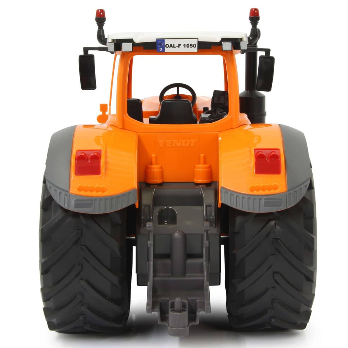 Rückansicht eines orangefarbenen Spielzeugtraktors mit großen Reifen und Fendt-Logo.