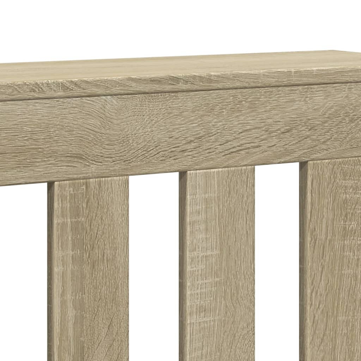 Detailansicht eines hellbraunen Holzmöbels mit vertikalen Streben.