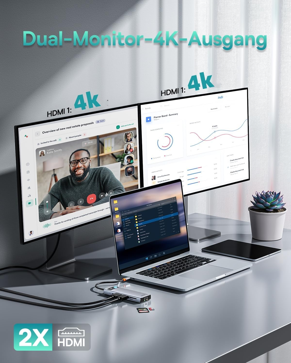 Zwei 4K-Monitore, ein Laptop und ein Docking-Hub auf einem Schreibtisch.