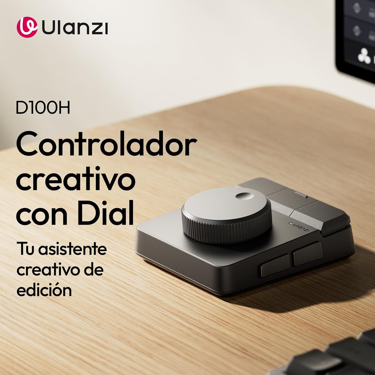 Un controlador de dial creativo Ulanzi D100H gris sobre un escritorio de madera.