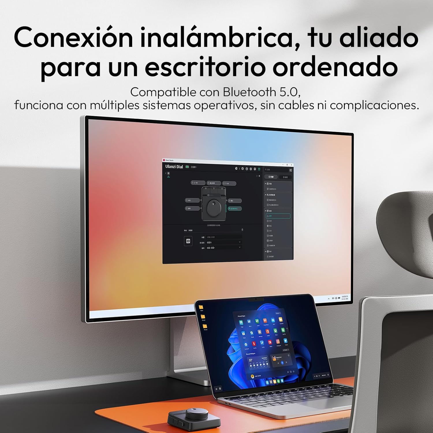 Un monitor y portátil muestran una configuración de conexión inalámbrica con un controlador giratorio.