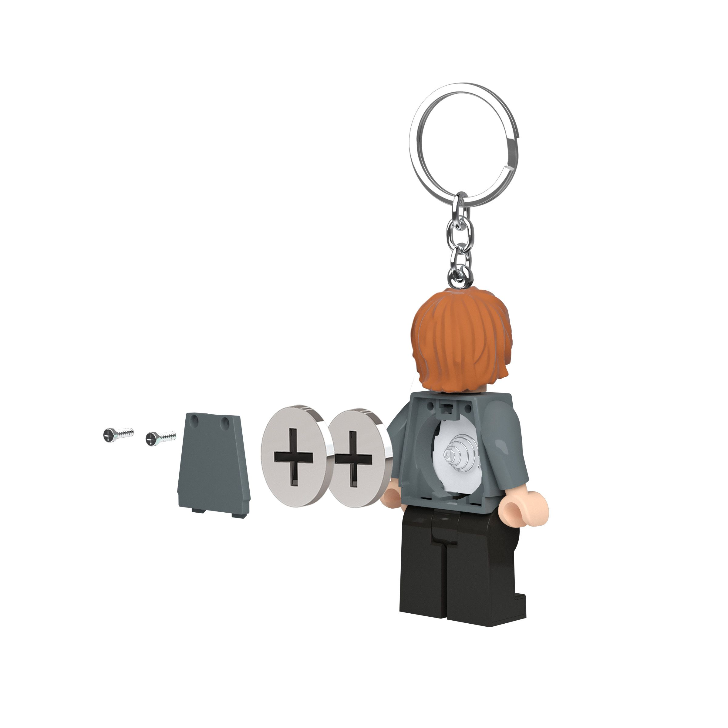 Un llavero Lego con pelo rojo y espalda abierta que revela pilas.