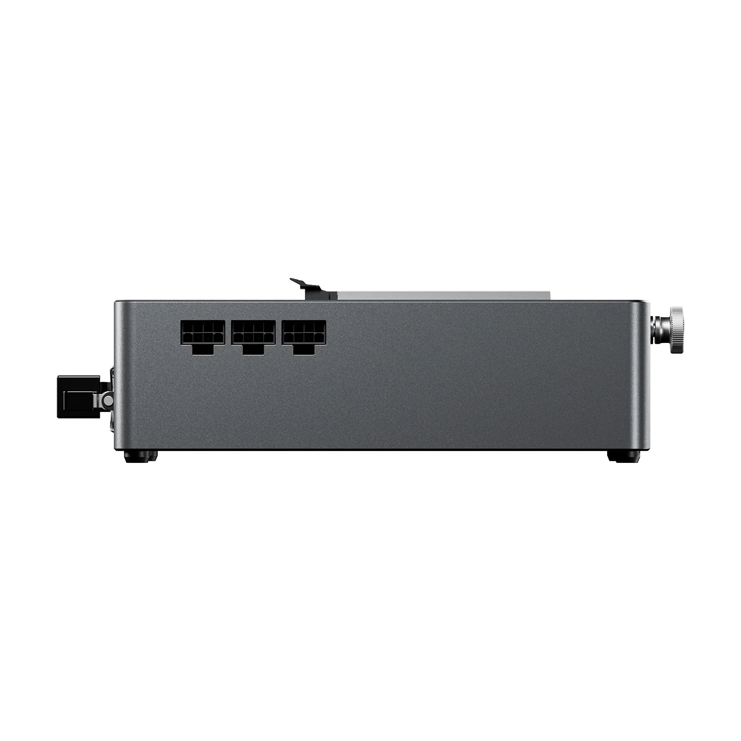 Dispositivo electrónico gris con puertos a la izquierda y una perilla a la derecha.