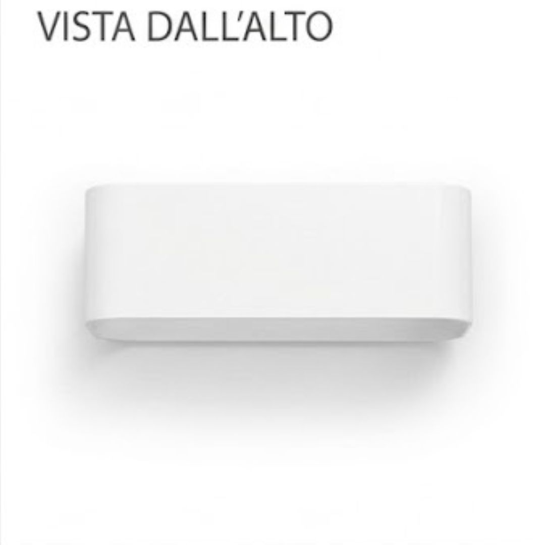 Una lampada bianca rettangolare con angoli arrotondati, vista dall'alto.