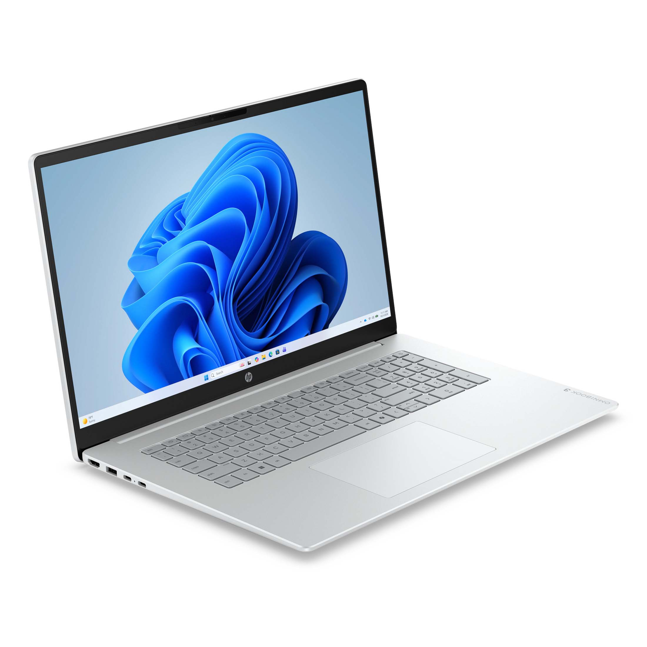 Ein silberner HP Laptop mit einem blauen Hintergrund auf dem Bildschirm.