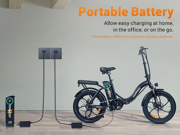 Una bicicletta elettrica pieghevole nera con batteria rimovibile in carica.