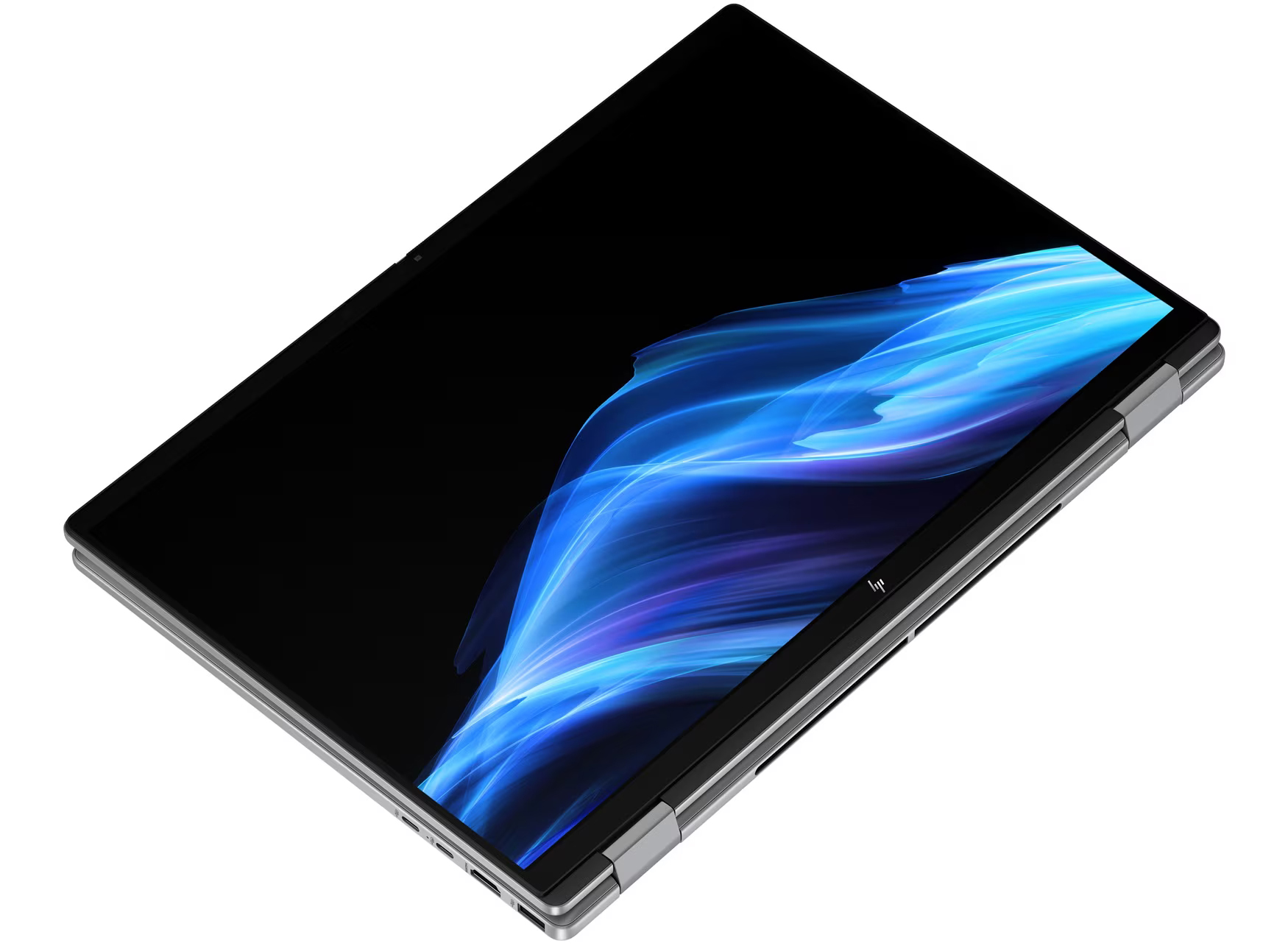 Otwarty laptop z niebieskim falistym wzorem na ekranie.