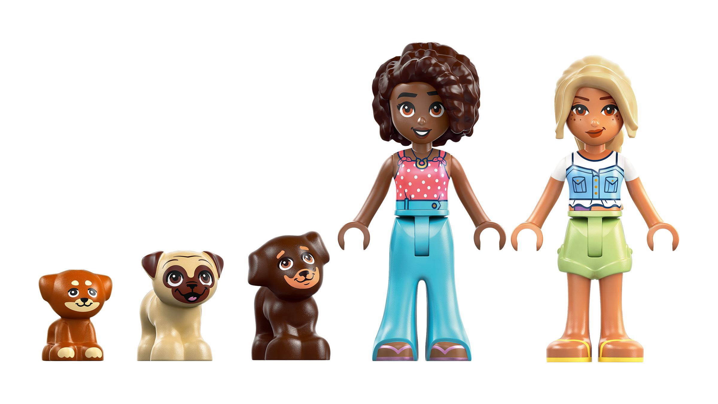 Due personaggi Lego e tre cani giocattolo su sfondo bianco.