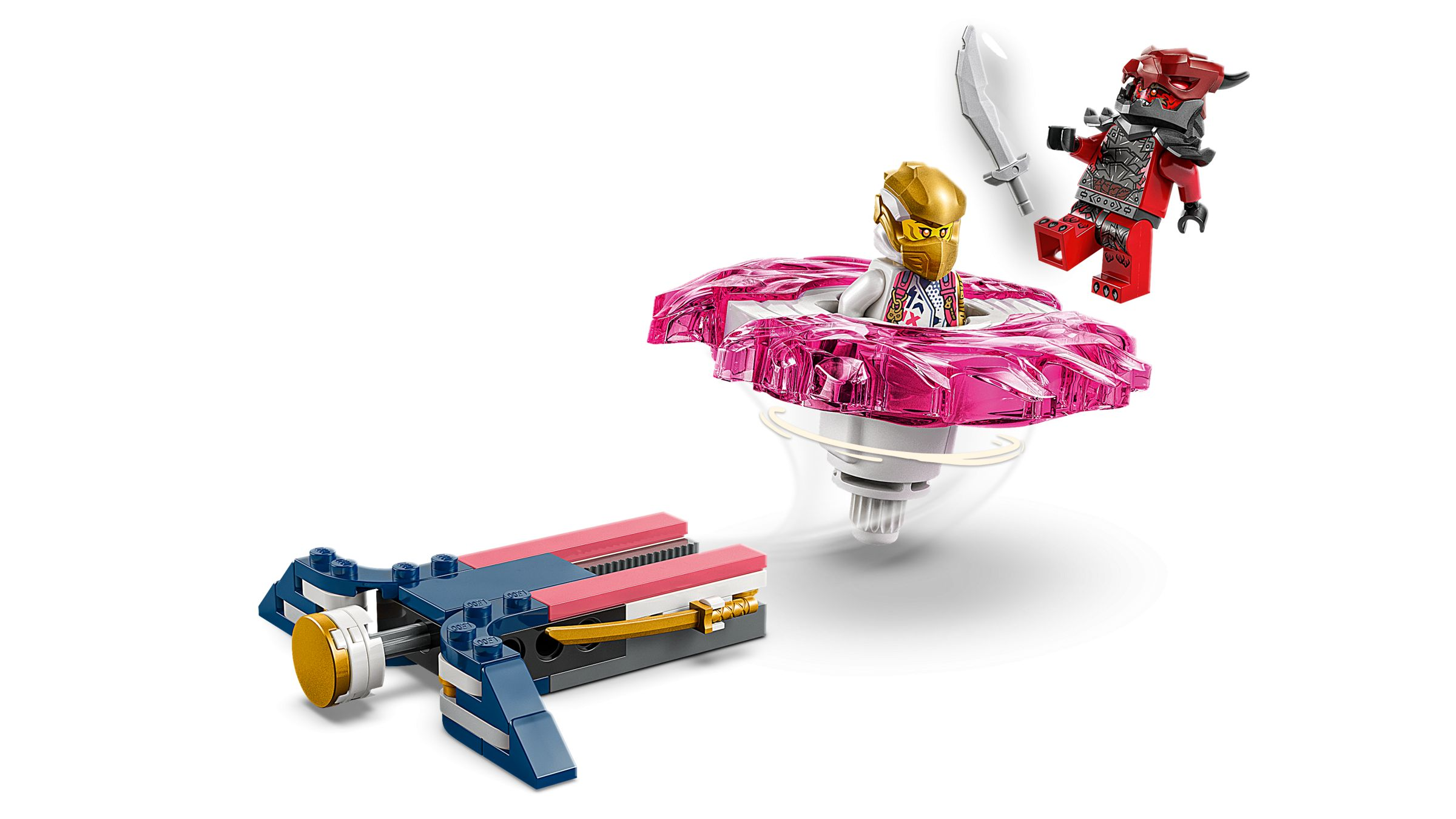 Lego-Ninja-Minifigur dreht sich in einem rosa Kristallkreisel, gestartet von einem blau-roten Werfer, gegen einen roten Gegner.