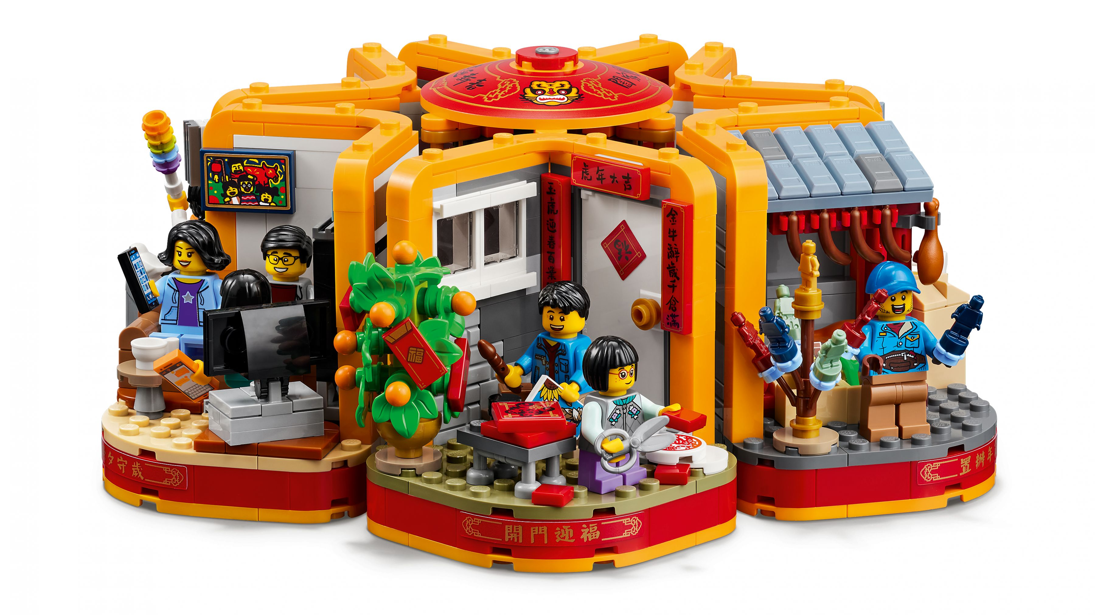 Un set Lego con più stanze e minifigure che celebrano il Capodanno cinese.