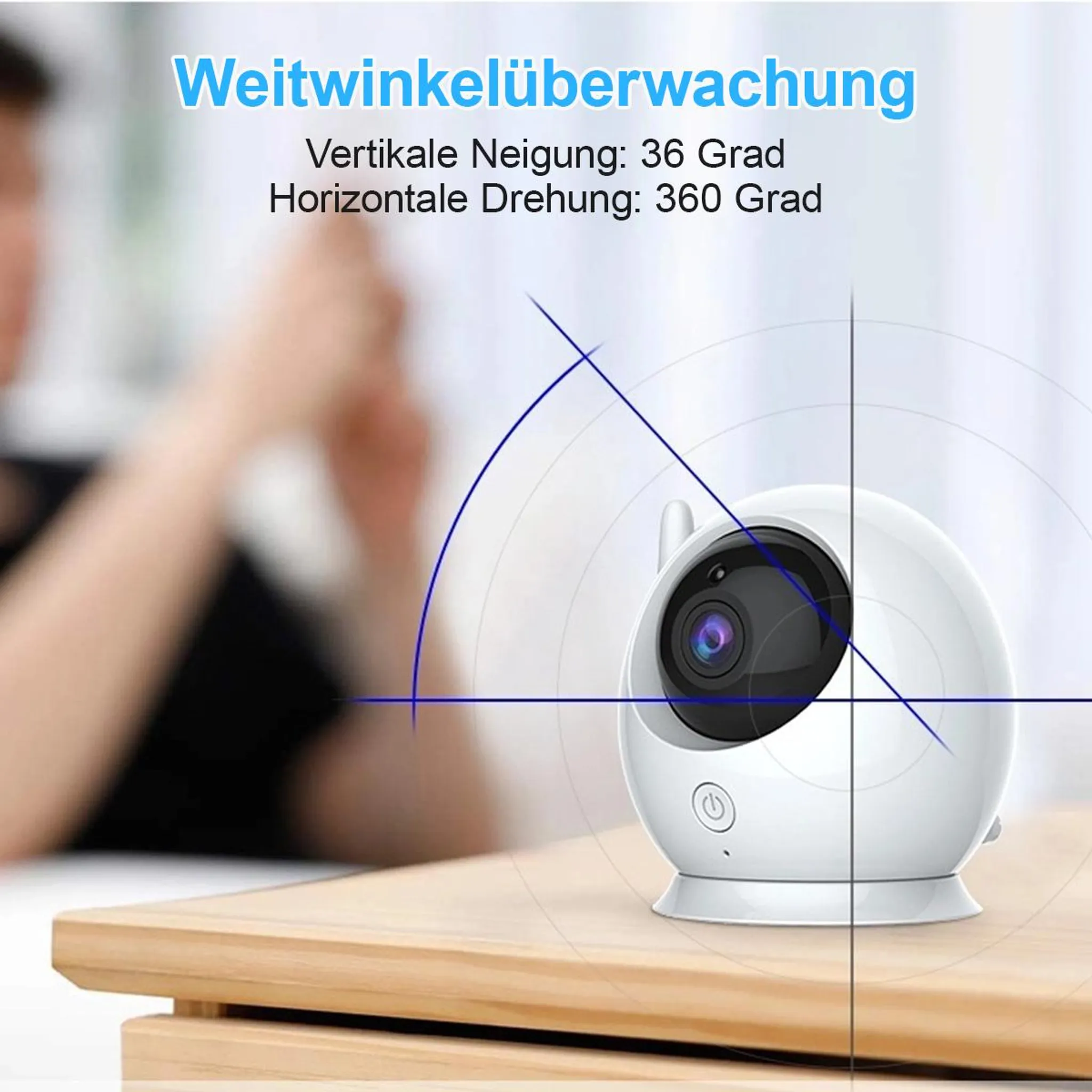 Weisse Überwachungskamera auf Holztisch mit Text über Blickwinkel.