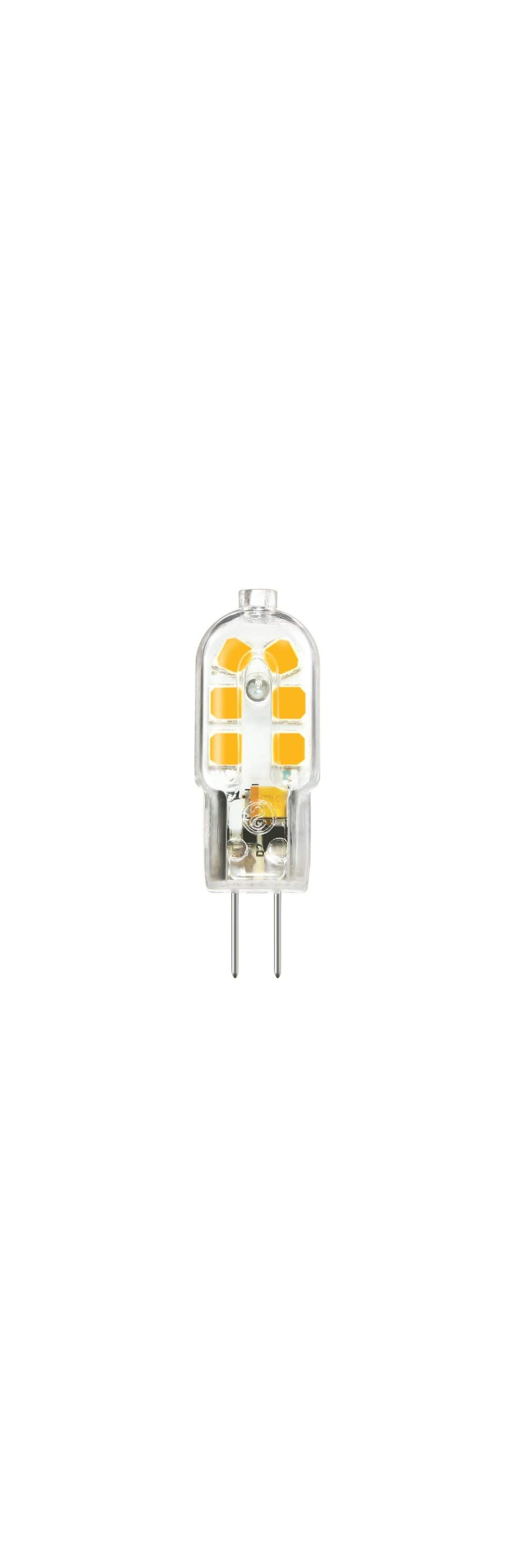 Eine kleine transparente LED-Stiftsockellampe mit zwei Metallpins auf weißem Hintergrund.