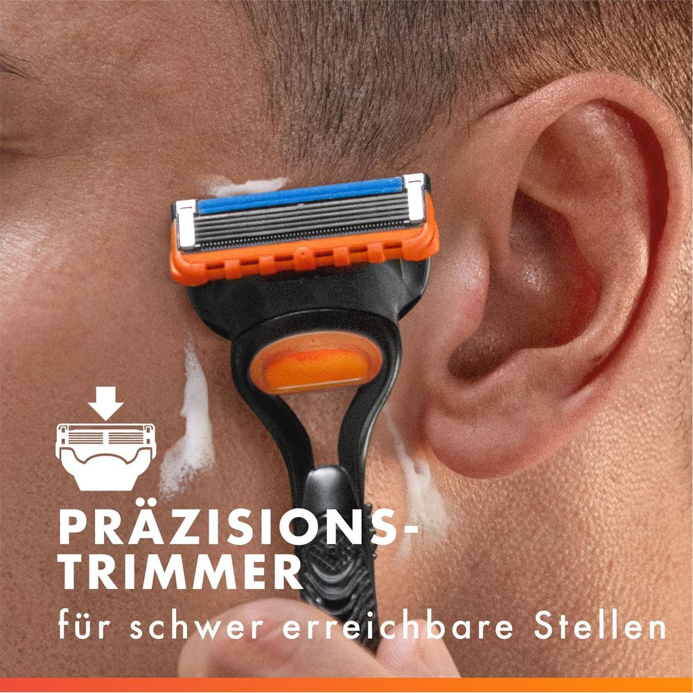 Un rasoio rade con precisione le basette con un rifinitore stretto.