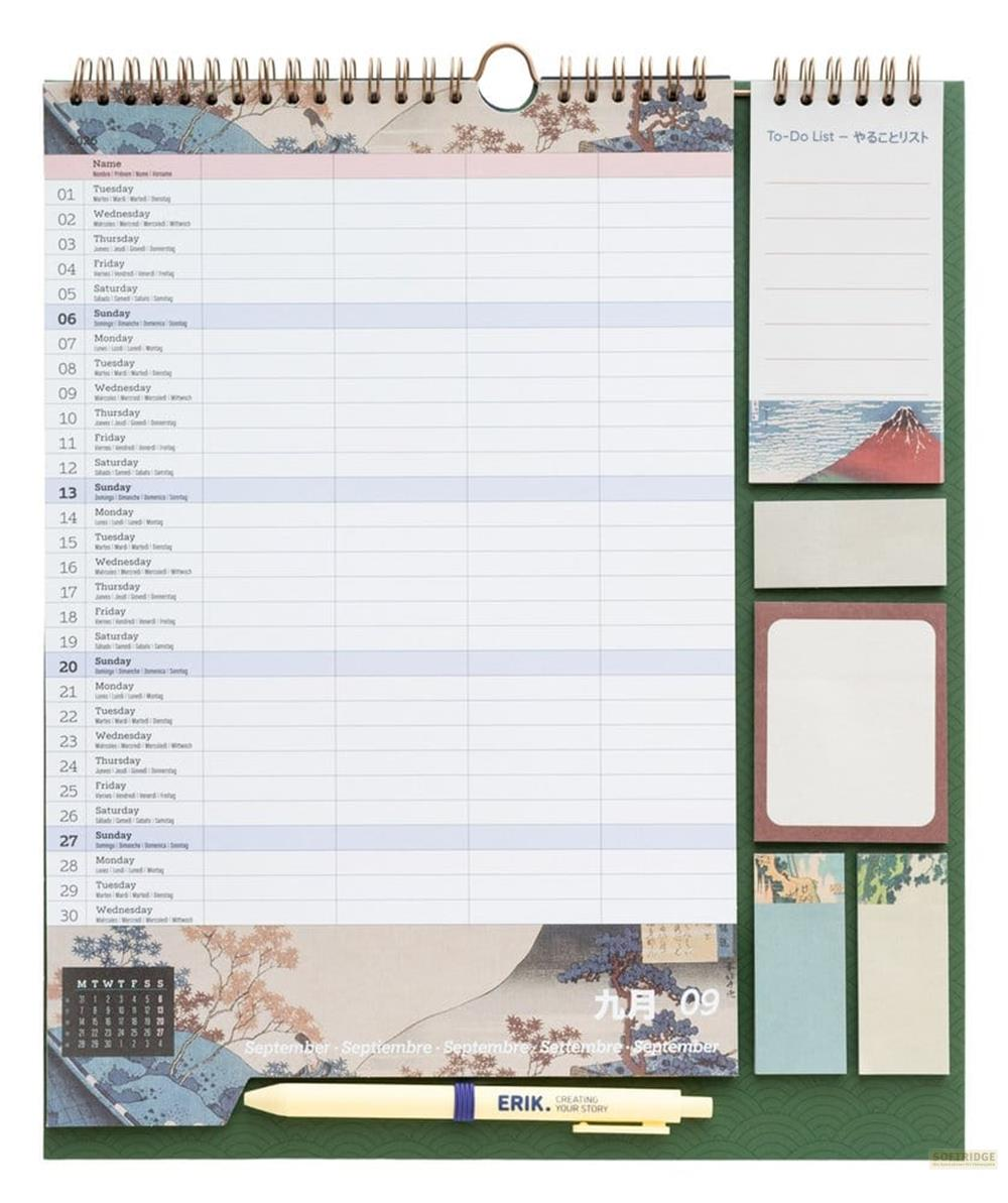 Un calendario de escritorio con planificación de septiembre, ilustraciones de paisajes y notas adhesivas.