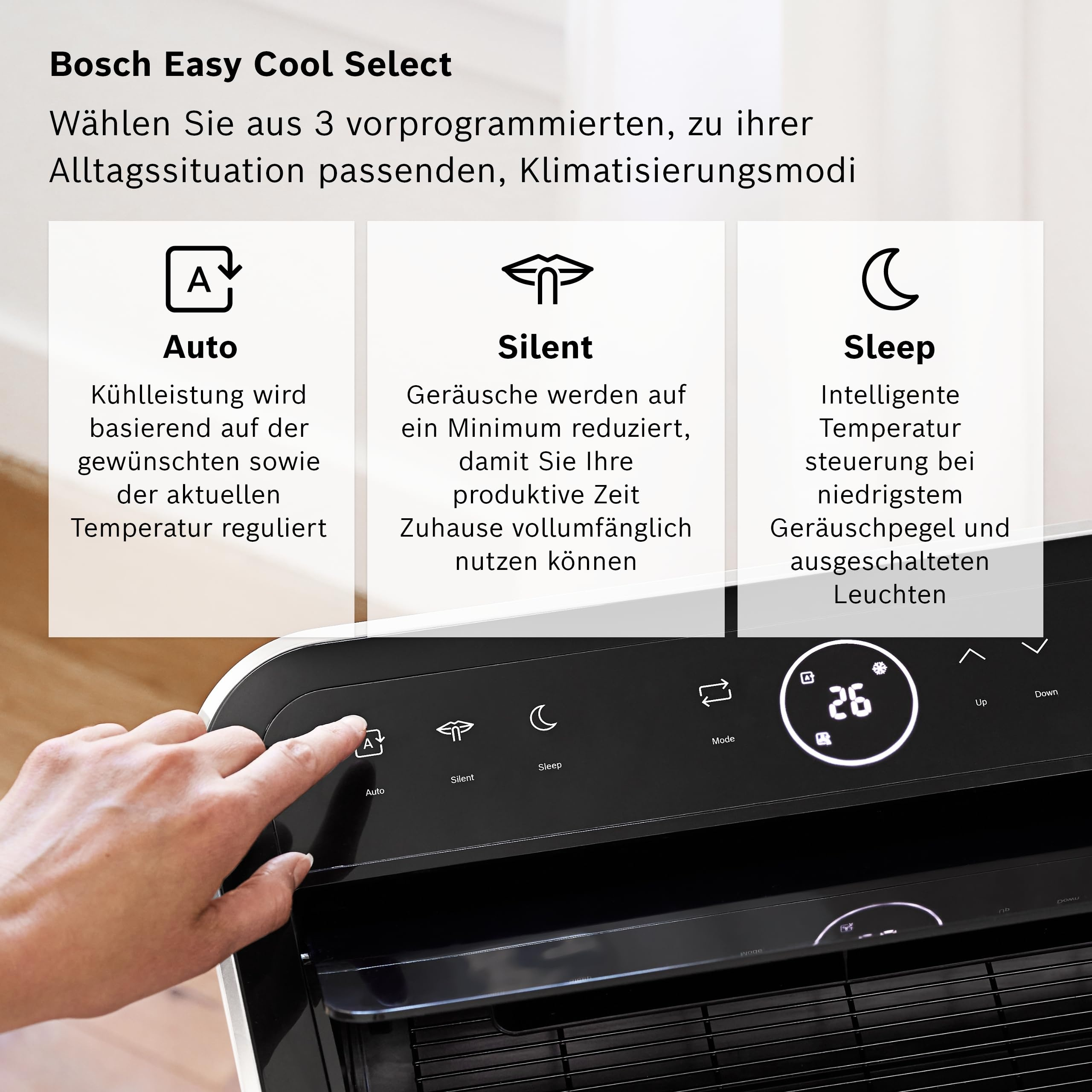 Mano che preme il tasto modalità auto su un condizionatore Bosch.