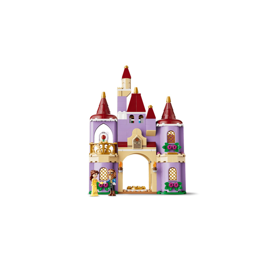 Castello Lego con tetti rossi, pareti viola e due minifigure davanti.