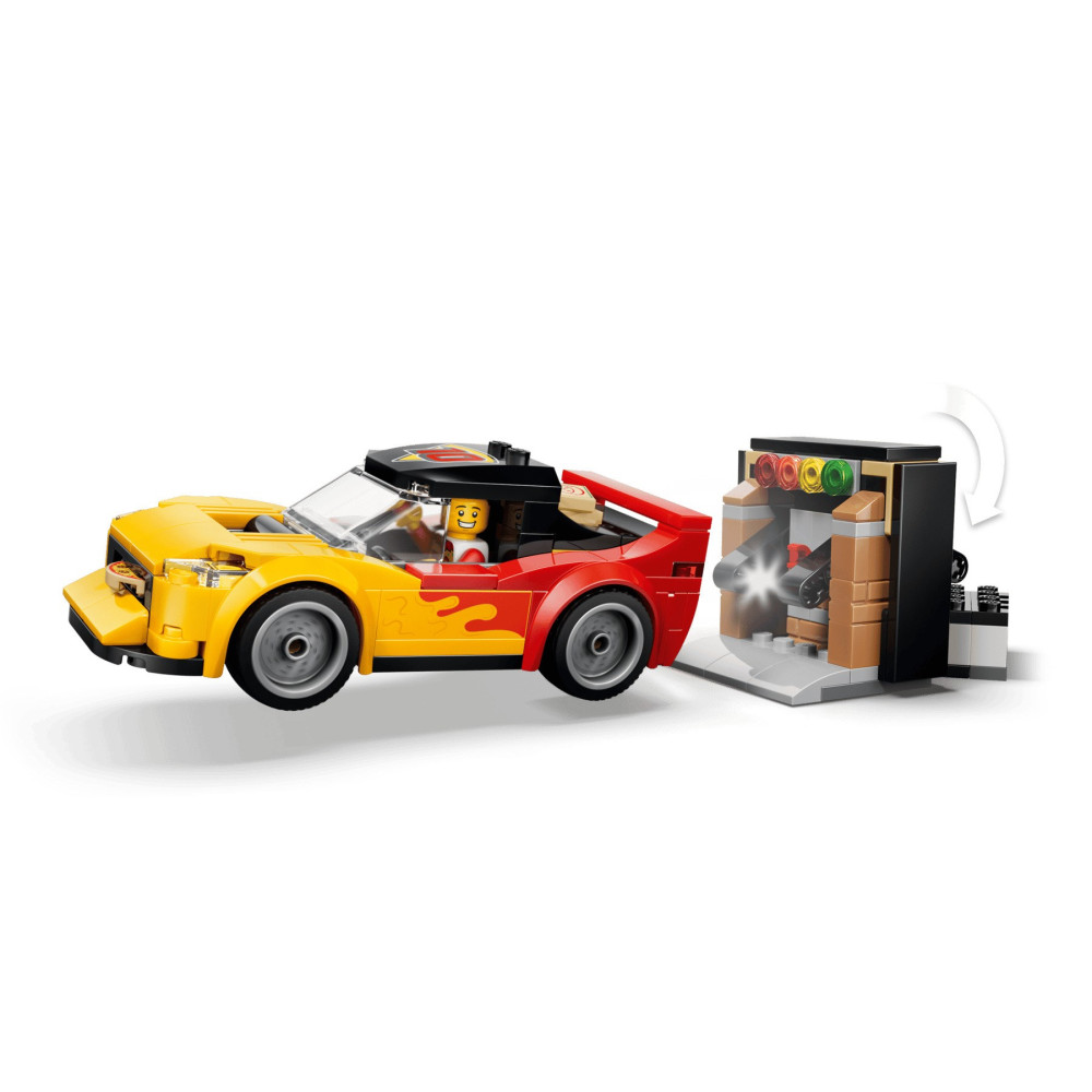 Un'auto giocattolo Lego esce da un garage con luci.