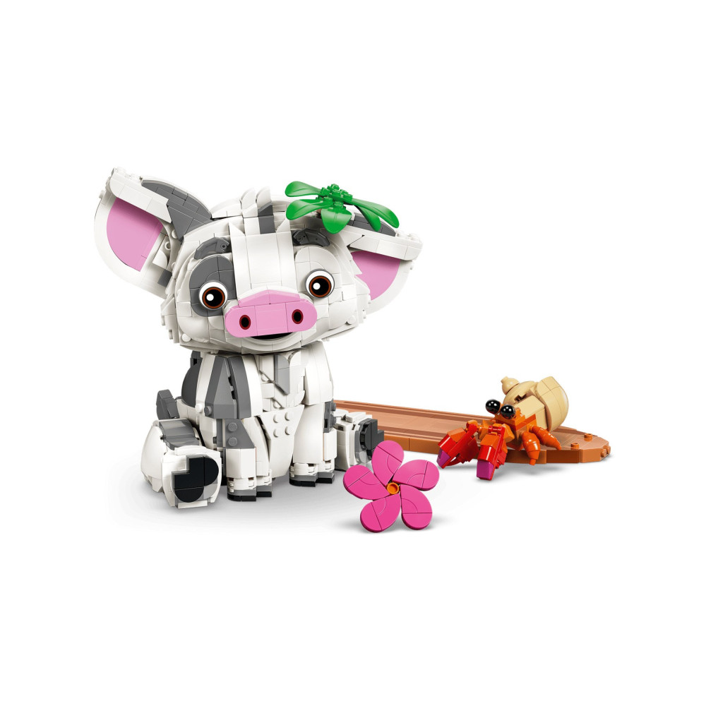 Figura Lego przedstawiająca słodką białą świnkę w czarne łaty, różowy kwiat i małego kraba.