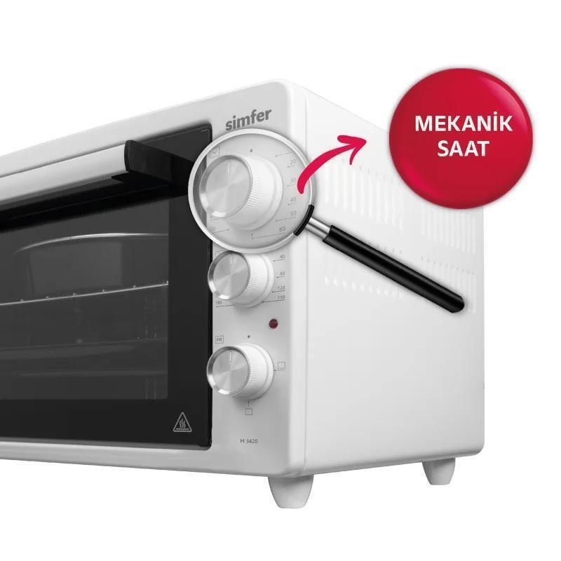 Döner düğmeli beyaz Simfer mini fırın, zamanlayıcı üzerinde büyüteç ve yanında kırmızı yazılı tabela.