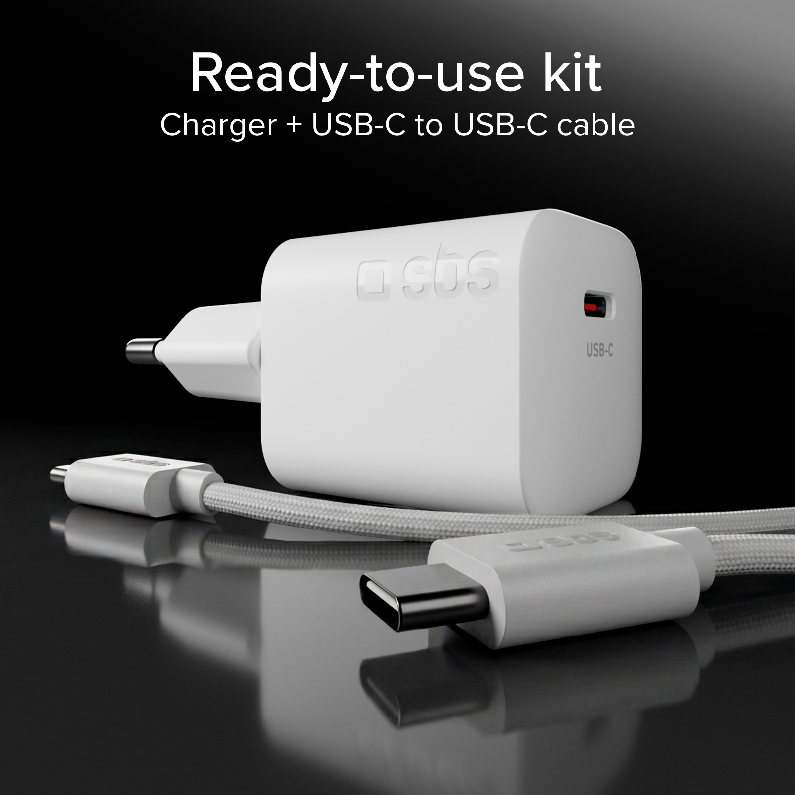 Un cargador de pared USB-C blanco con un cable USB-C trenzado sobre fondo negro.