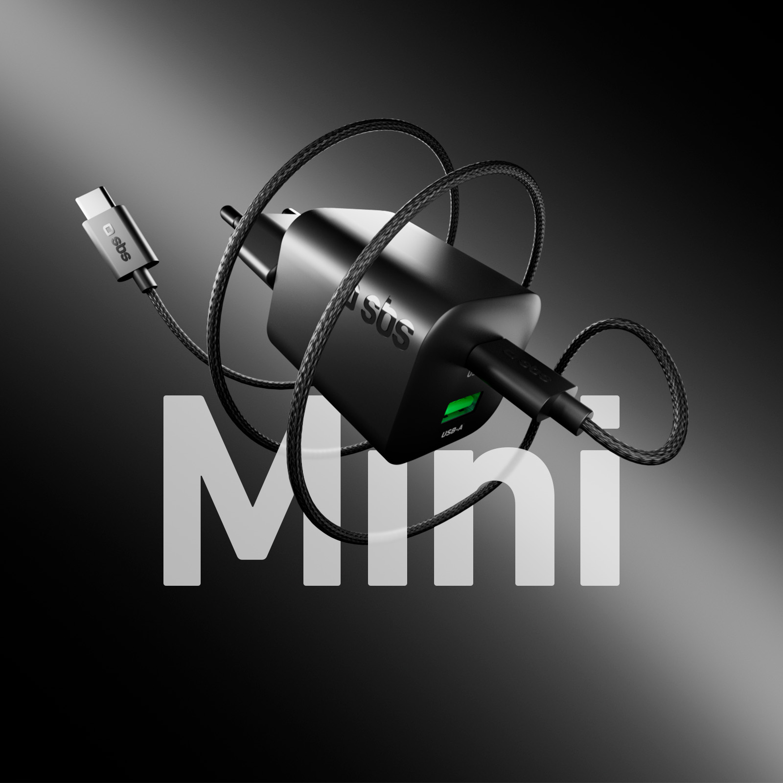 Mini cargador negro con cable USB trenzado y la palabra Mini sobre fondo oscuro.