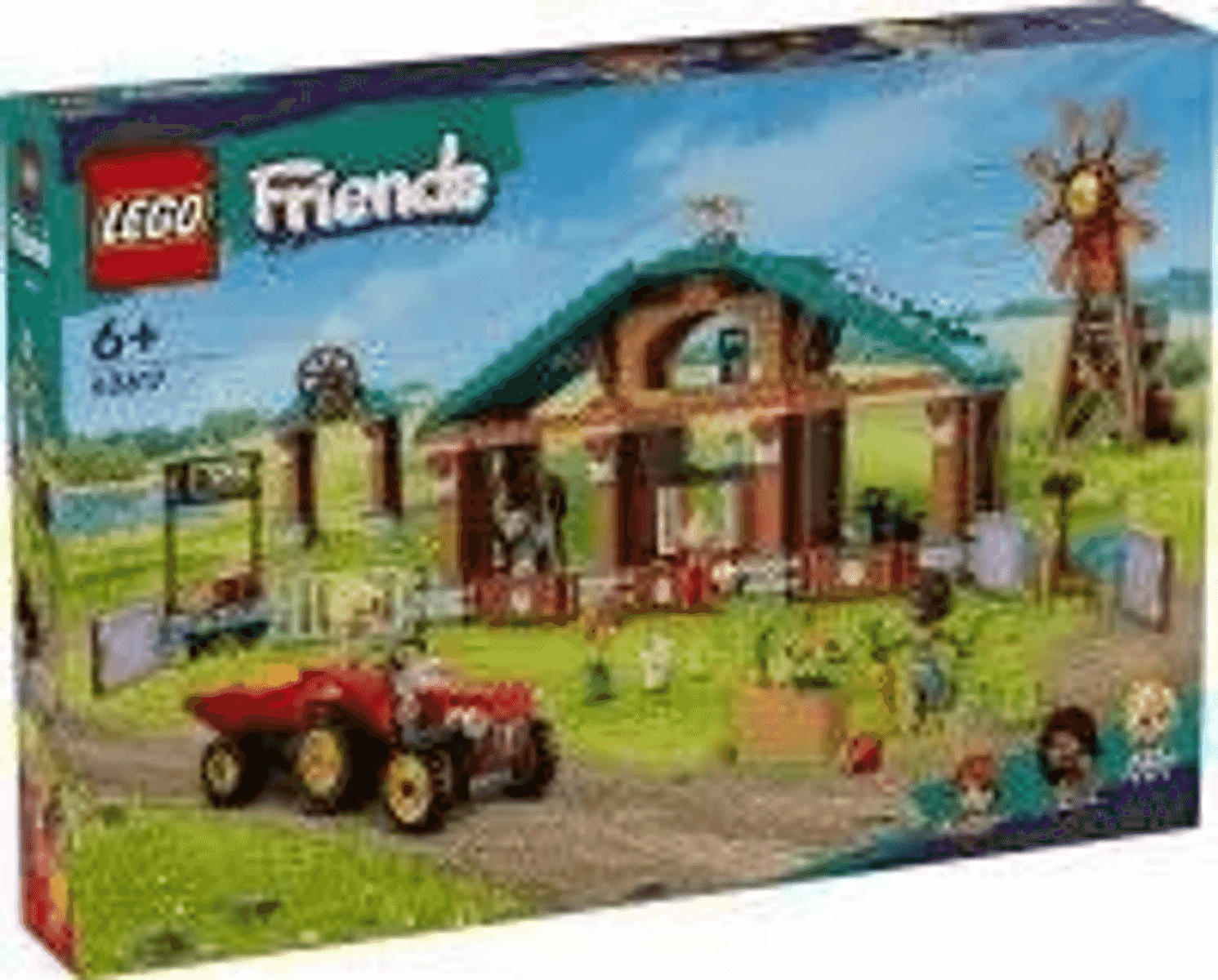 La scatola di Lego Friends mostra una fattoria con fienile, trattore rosso e mulino.