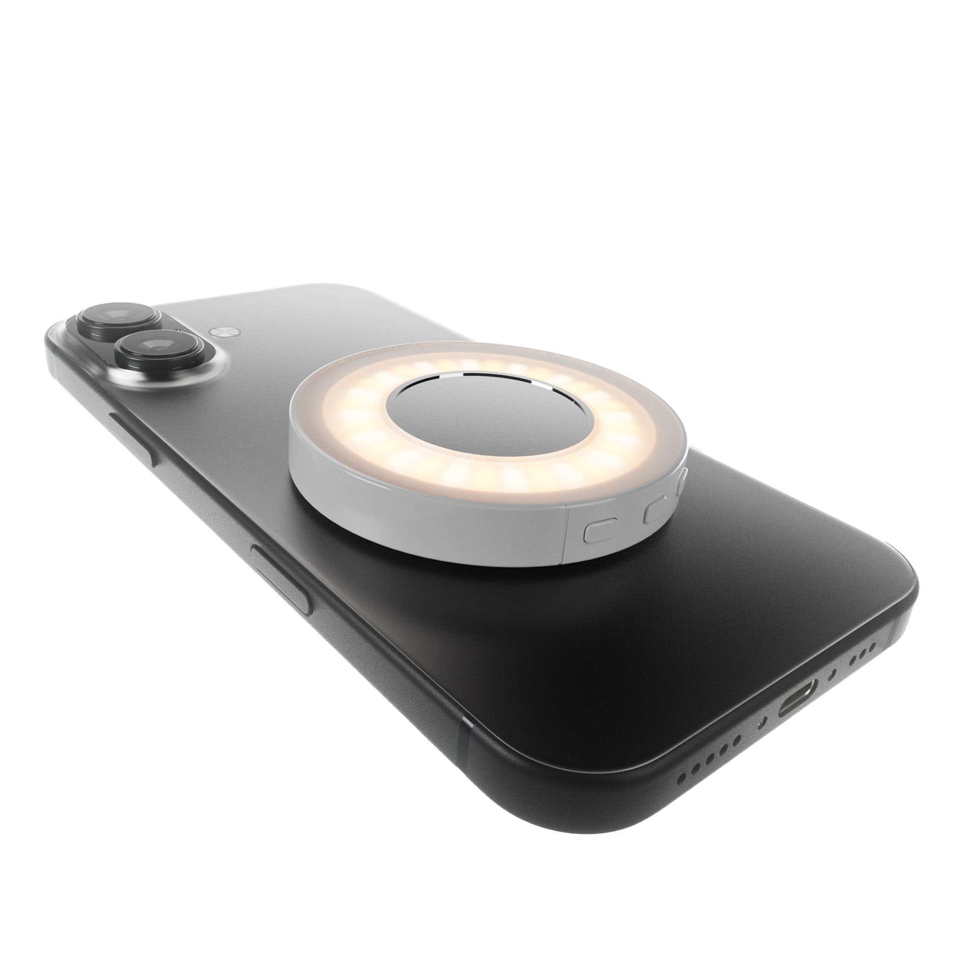 Un accesorio de luz anular iluminado montado magnéticamente en la parte trasera de un smartphone negro sobre fondo blanco.