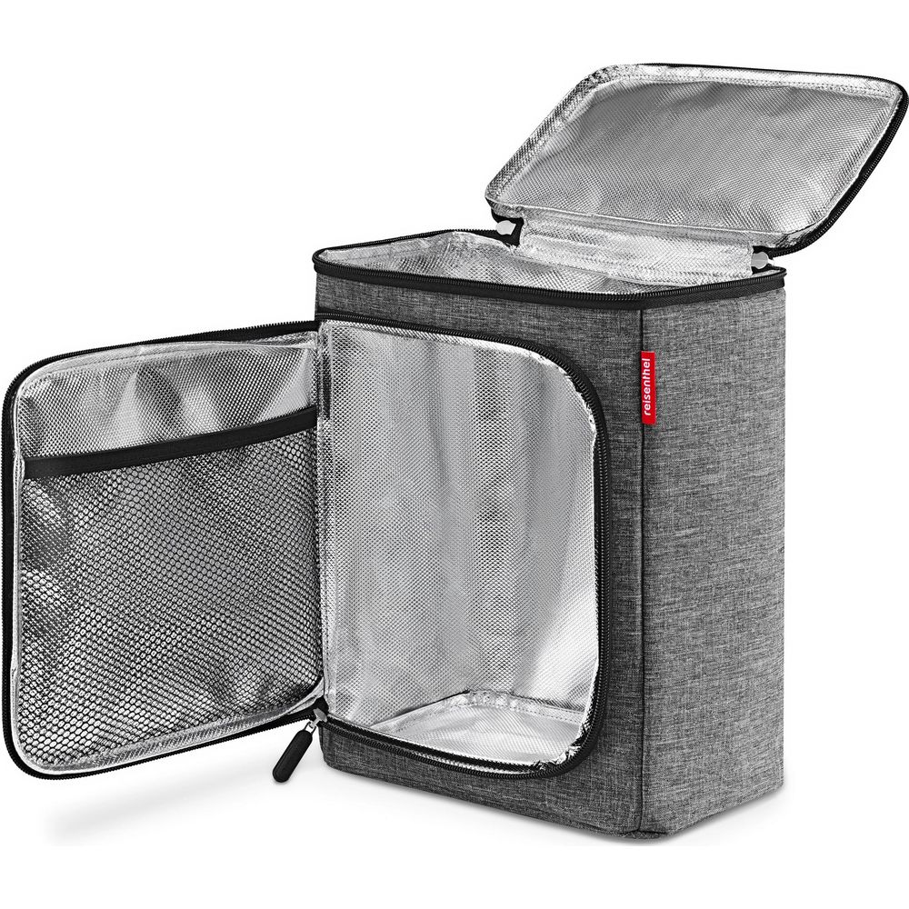 Sac isotherme gris Reisenthel avec intérieur thermique argenté ouvert et poche en filet sur le couvercle.